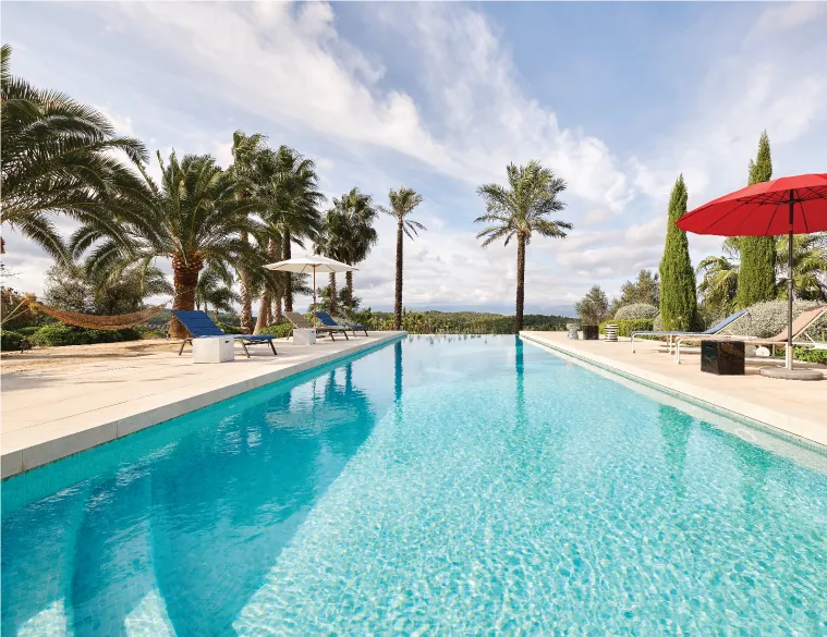 Heated infinity pool overlooking the Mallorca countryside at The Lions Villa