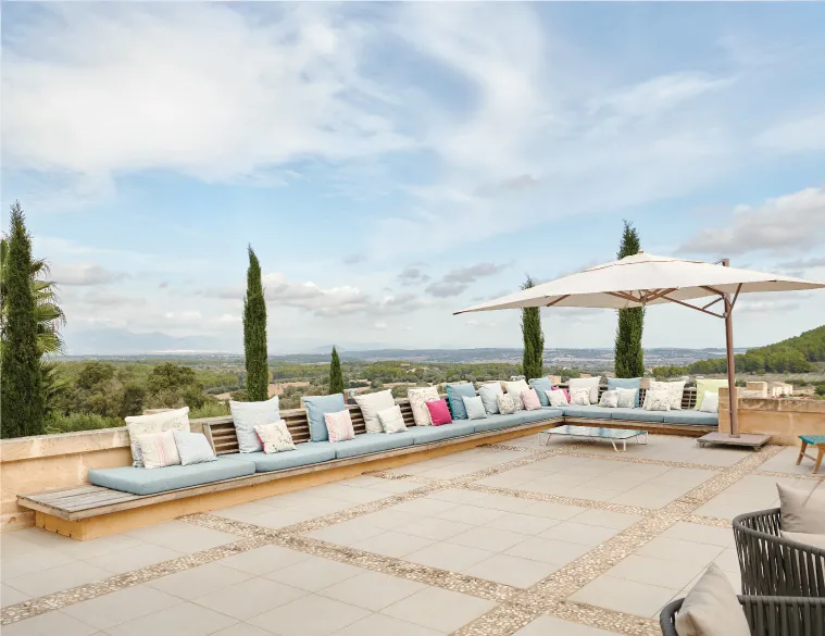 Spacious sun terrace at The Lions Villa overlooking Mallorca's countryside