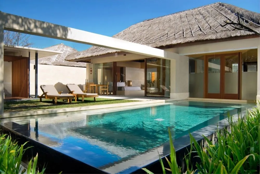 Couple enjoying a peaceful moment at The Bale Nusa Dua – a serene adults-only retreat in one of Bali’s most family-friendly destinations